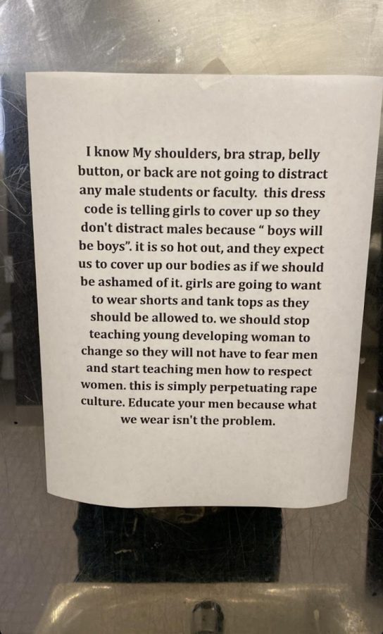 Posters like these have been posted around campus, a clear sign of discontent with the new dress code policies.
