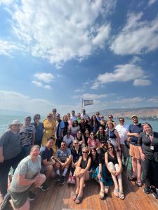 Group photo of the educators on a boat to Tiberius