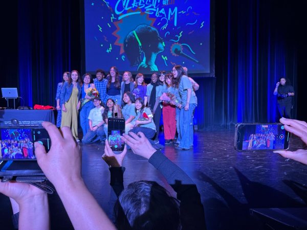 Venice HSs poets and Keppels poets pose for a group photo after the two teams win the Classic Slam in the first-ever tie in the competitions history.